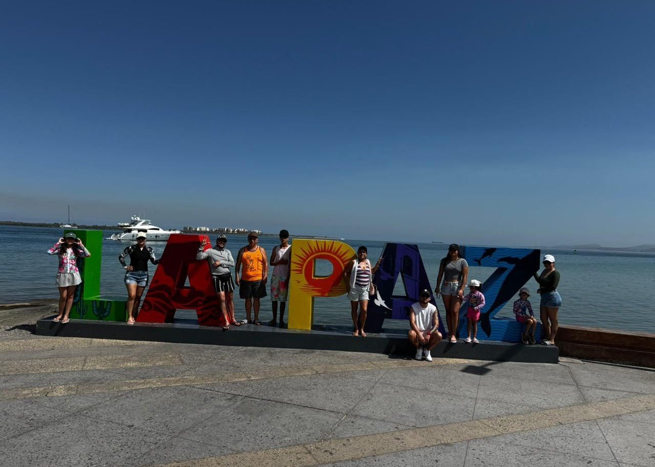 Clientes felices en la playa